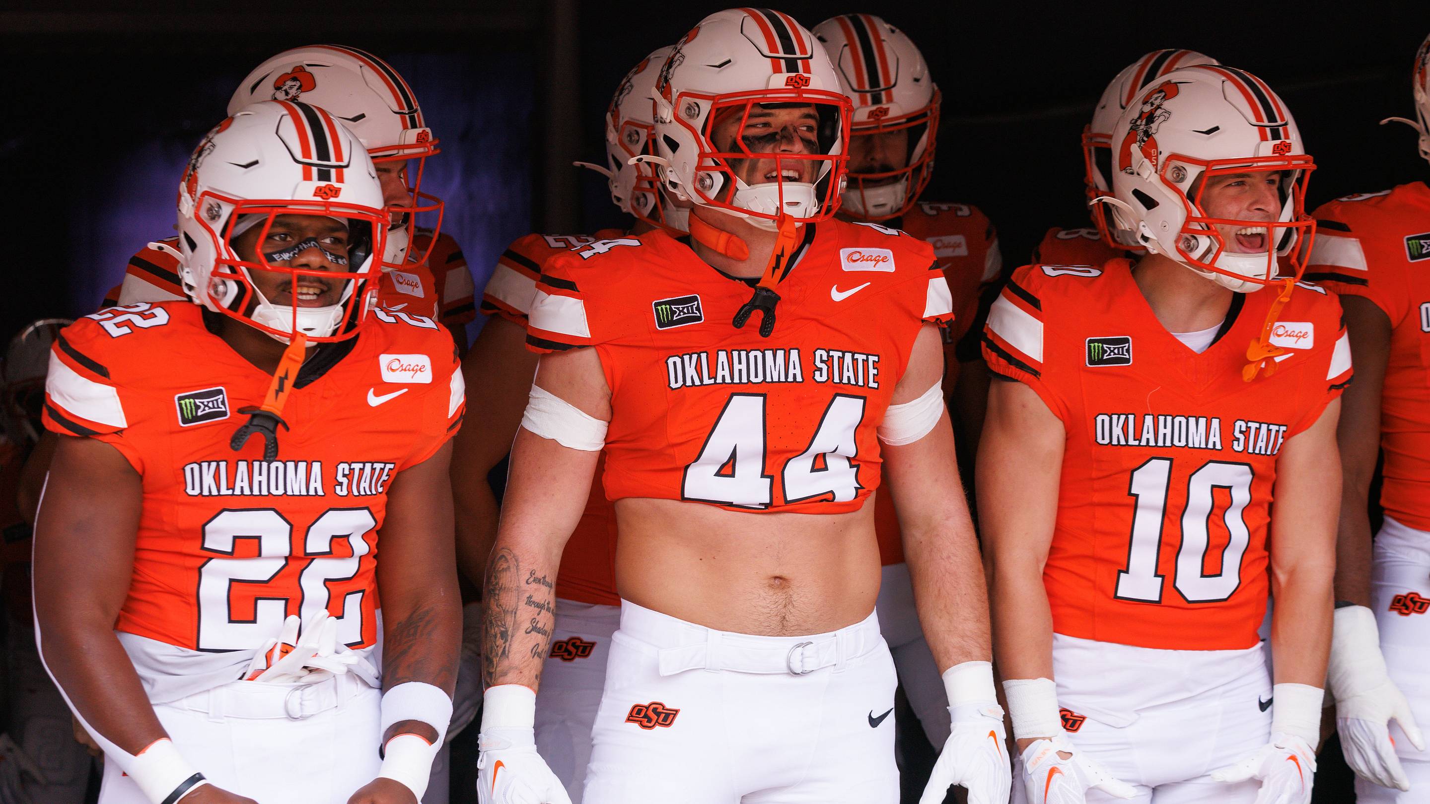 Oklahoma State Cowboys running back William Mason (22), tight end Carson Kolb (44) and wide receiver Wyatt Young. | IMAGN IMAGES via Reuters Connect