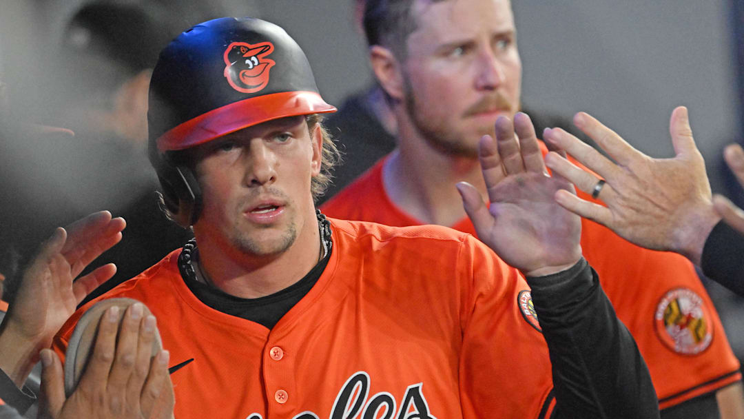 Mar 29, 2025; Toronto, Ontario, CAN; Baltimore Orioles designated hitter Adley Rutschmann (35) celebrates with team mates in the dugout after scoring a run against the Toronto Blue Jays in the fifth inning at Rogers Centre. / Dan Hamilton-Imagn Images Mar 29, 2025; Toronto, Ontario, CAN; Baltimore Orioles designated hitter Adley Rutschmann (35) celebrates with team mates in the dugout after scoring a run against the Toronto Blue Jays in the fifth inning at Rogers Centre. / Dan Hamilton-Imagn Images