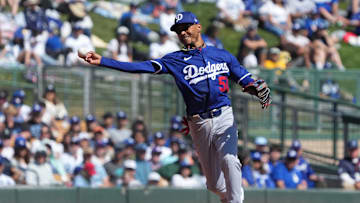 Mar 8, 2025; Phoenix, Arizona, USA; Los Angeles Dodgers shortstop Mookie Betts (50) makes the play for an out against the Chicago White Sox in the second inning at Camelback Ranch-Glendale. Mandatory Credit: Rick Scuteri-Imagn Images
