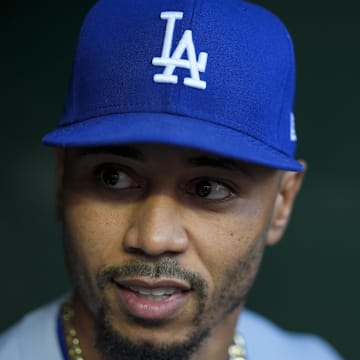 Jul 29, 2025; Cincinnati, Ohio, USA;  Los Angeles Dodgers shortstop Mookie Betts (50) stands in the dugout before the game against the Cincinnati Reds at Great American Ball Park. Mandatory Credit: Aaron Doster-Imagn Images