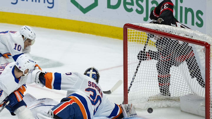 Mar 19, 2026; Ottawa, Ontario, CAN; Ottawa Senators left wing Warren Foegele (37) scores against New York Islanders goalie Ilya Sorokin (30) in the third period at the Canadian Tire Centre. Mandatory Credit: Marc DesRosiers-IMAGN Images