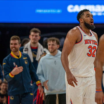 Mar 15, 2025; San Francisco, California, USA; New York Knicks center Karl-Anthony Towns (32) reacts after being called for a foul against the Golden State Warriors during the fourth quarter at Chase Center. Mandatory Credit: Neville E. Guard-Imagn Images