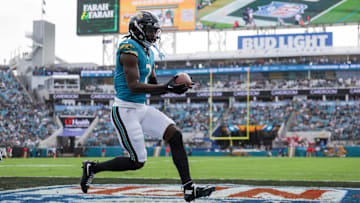 Dec 15, 2024; Jacksonville, Florida, USA; Jacksonville Jaguars wide receiver Brian Thomas Jr. (7) scores a touchdown against the New York Jets in the first quarter at EverBank Stadium. Mandatory Credit: Nathan Ray Seebeck-Imagn Images