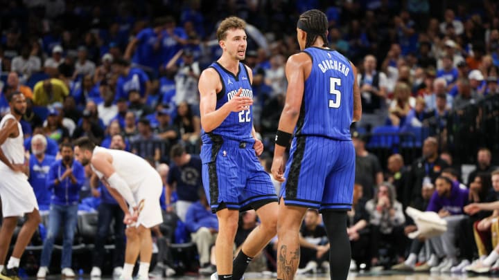 Apr 27, 2024: Orlando Magic forward Franz Wagner (22) and forward Paolo Banchero (5) celebrate after a basket against the Cleveland Cavaliers in the third quarter during game four of the first round for the 2024 NBA playoffs at Kia Center. 