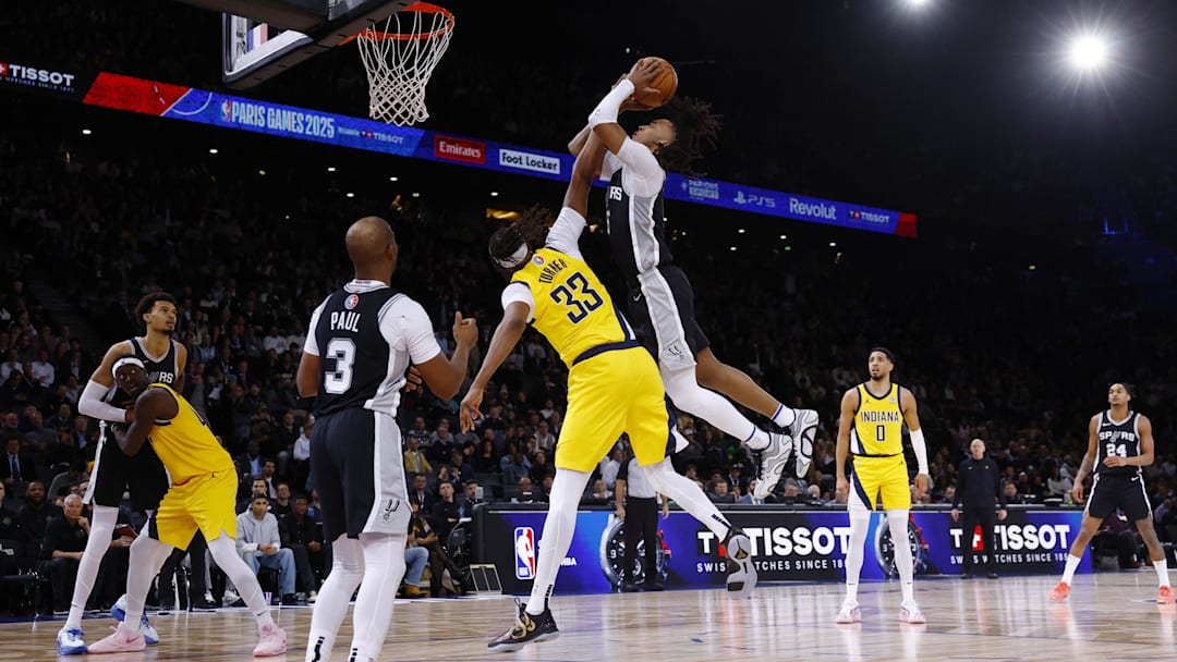 [US, Mexico, & Canada customers only] Jan 23, 2025; Paris, FRANCE; San Antonio Spurs player Stephon Castle shoots against Indiana Pacers player Myles Turner  in the Paris Games 2025 NBA basketball game at Accor Arena. Mandatory Credit: Stephanie Lecocq/Reuters via Imagn Images