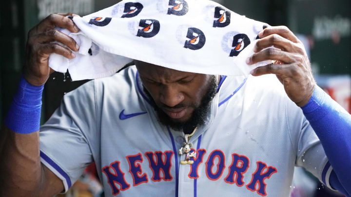 Jun 21, 2024; Chicago, Illinois, USA; New York Mets outfielder Starling Marte (6) cools off in the dugout against the Chicago Cubs during the seventh inning at Wrigley Field. Mandatory Credit: David Banks-USA TODAY Sports