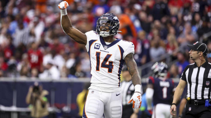 Dec 3, 2023; Houston, Texas, USA; Denver Broncos wide receiver Courtland Sutton (14) reacts after scoring a touchdown during the third quarter against the Houston Texans at NRG Stadium. Mandatory Credit: Troy Taormina-USA TODAY Sports