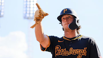 Sep 21, 2024; Cincinnati, Ohio, USA; Pittsburgh Pirates outfielder Billy Cook (28) reacts after hitting a solo home run in the ninth inning against the Cincinnati Reds at Great American Ball Park. Mandatory Credit: Katie Stratman-Imagn Images