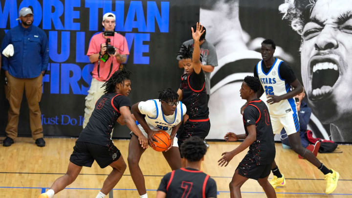 July 18, 2024; North Augusta, S.C., USA; Athletes battle for the ball during the Team Melo and Georgia Stars game at the Nike Peach Jam at Riverview Park Activities Center. The Georgia Stars won 64-63. Mandatory Credit: Katie Goodale-USA TODAY Network