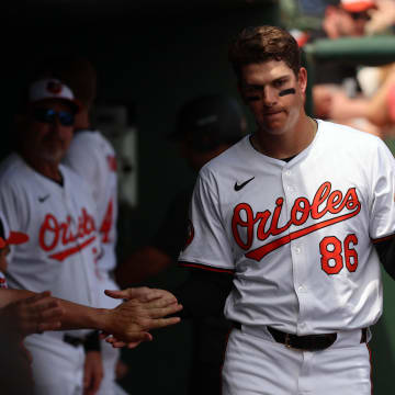 Mar 16, 2024; Sarasota, Florida, USA;  Baltimore Orioles infielder Coby Mayo (86) scores a run during the fifth inning against the Boston Red Sox at Ed Smith Stadium.