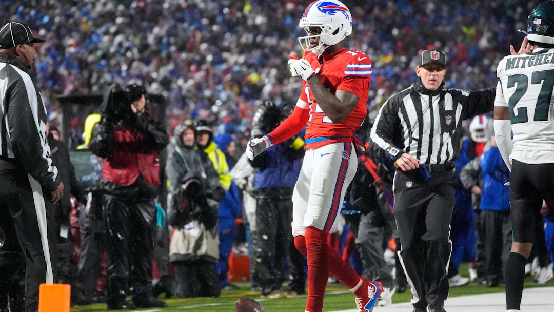 Dec 28, 2025; Orchard Park, New York, USA; Buffalo Bills wide receiver Tyrell Shavers (14) reacts after catching a thirty-two yard pass thrown by quarterback Josh Allen (not pictured) against the Philadelphia Eagles during the third quarter at Highmark Stadium. Mandatory Credit: Gregory Fisher-Imagn Images
