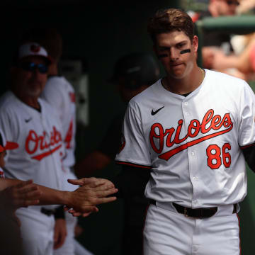 Mar 16, 2024; Sarasota, Florida, USA;  Baltimore Orioles infielder Coby Mayo (86) scores a run during the fifth inning against the Boston Red Sox at Ed Smith Stadium