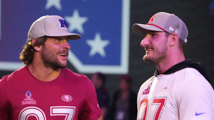 NFC defensive end Nick Bosa of the San Francisco 49ers (left) with brother and AFC linebacker Joey Bosa (right)