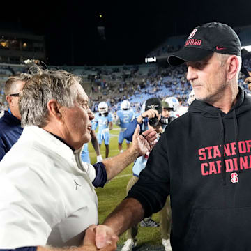 Nov 8, 2025; Chapel Hill, North Carolina, USA; North Carolina Tar Heels head coach Bill Belichick with Stanford Cardinal head coach Frank Reich after the game at Kenan Stadium. Mandatory Credit: Bob Donnan-Imagn Images