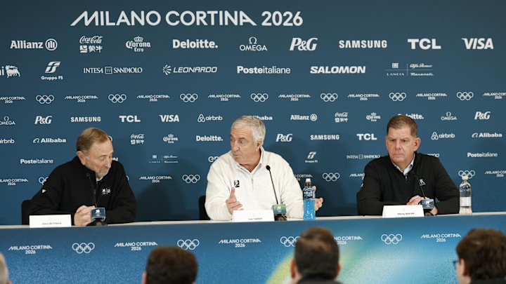 Feb 12, 2026; Milan, Italy; From left NHL commissioner Gary Bettman, IIHF President Luc Tardif, and NHLPA executive director Marty Walsh at a men's ice hockey press conference during the Milano Cortina 2026 Olympic Winter Games at Milano Santagiulia Ice Hockey Arena. Mandatory Credit: Geoff Burke-Imagn Images