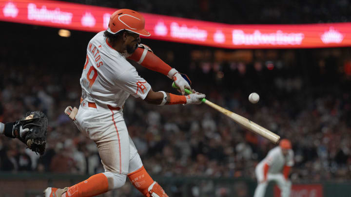 May 28, 2024; San Francisco, California, USA;  San Francisco Giants outfielder Luis Matos (29) hits a sacrifice fly for a walk off RBI during the tenth inning against the Philadelphia Phillies at Oracle Park. Stan Szeto-USA TODAY Sports