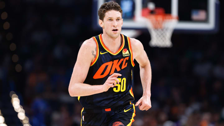 Apr 14, 2024; Oklahoma City, Oklahoma, USA; Oklahoma City Thunder center Mike Muscala (50) runs down the court against the Dallas Mavericks during the second half at Paycom Center. Mandatory Credit: Alonzo Adams-USA TODAY Sports