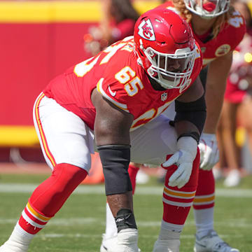 Aug 17, 2024; Kansas City, Missouri, USA; Kansas City Chiefs guard Trey Smith (65) on the line of scrimmage against the Detroit Lions during the game at GEHA Field at Arrowhead Stadium. Mandatory Credit: Denny Medley-Imagn Images