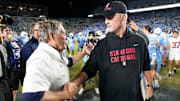 Nov 8, 2025; Chapel Hill, North Carolina, USA; North Carolina Tar Heels head coach Bill Belichick with Stanford Cardinal head coach Frank Reich after the game at Kenan Stadium. Mandatory Credit: Bob Donnan-Imagn Images