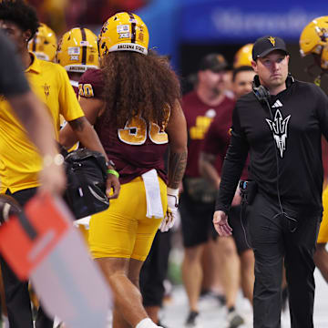 Jan 1, 2025; Atlanta, GA, USA; Arizona State Sun Devils head coach Kenny Dillingham looks on during the first half of the Peach Bowl at Mercedes-Benz Stadium. Mandatory Credit: Brett Davis-Imagn Images