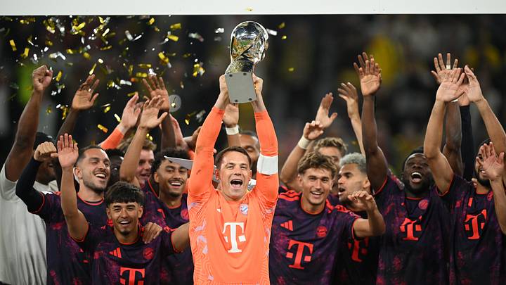 Bayern Munich skipper Manuel Neuer lifting the Franz Beckenbauer Supercup.