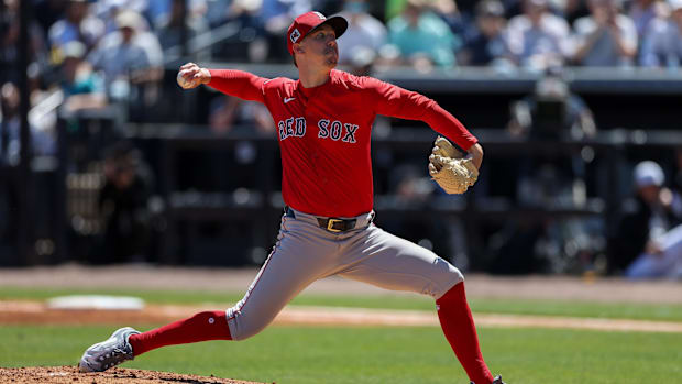Boston Red Sox pitcher Walker Buehler (0) throws a pitch against the New York Yankees in the first inning of spring training.
