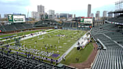 Nov 15, 2025; Chicago, Illinois, USA; Northwestern Wildcats and Michigan Wolverines warm up before the game at Wrigley Field.