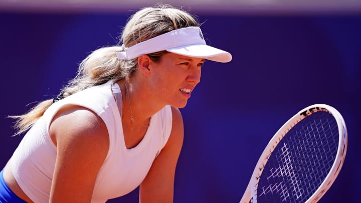 Jul 28, 2024; Paris, France; Danielle Collins (USA) hits the ball against Laura Siegemund (CAN) in the women’s tennis singles first round during the Paris 2024 Olympic Summer Games at Stade Roland Garros. 