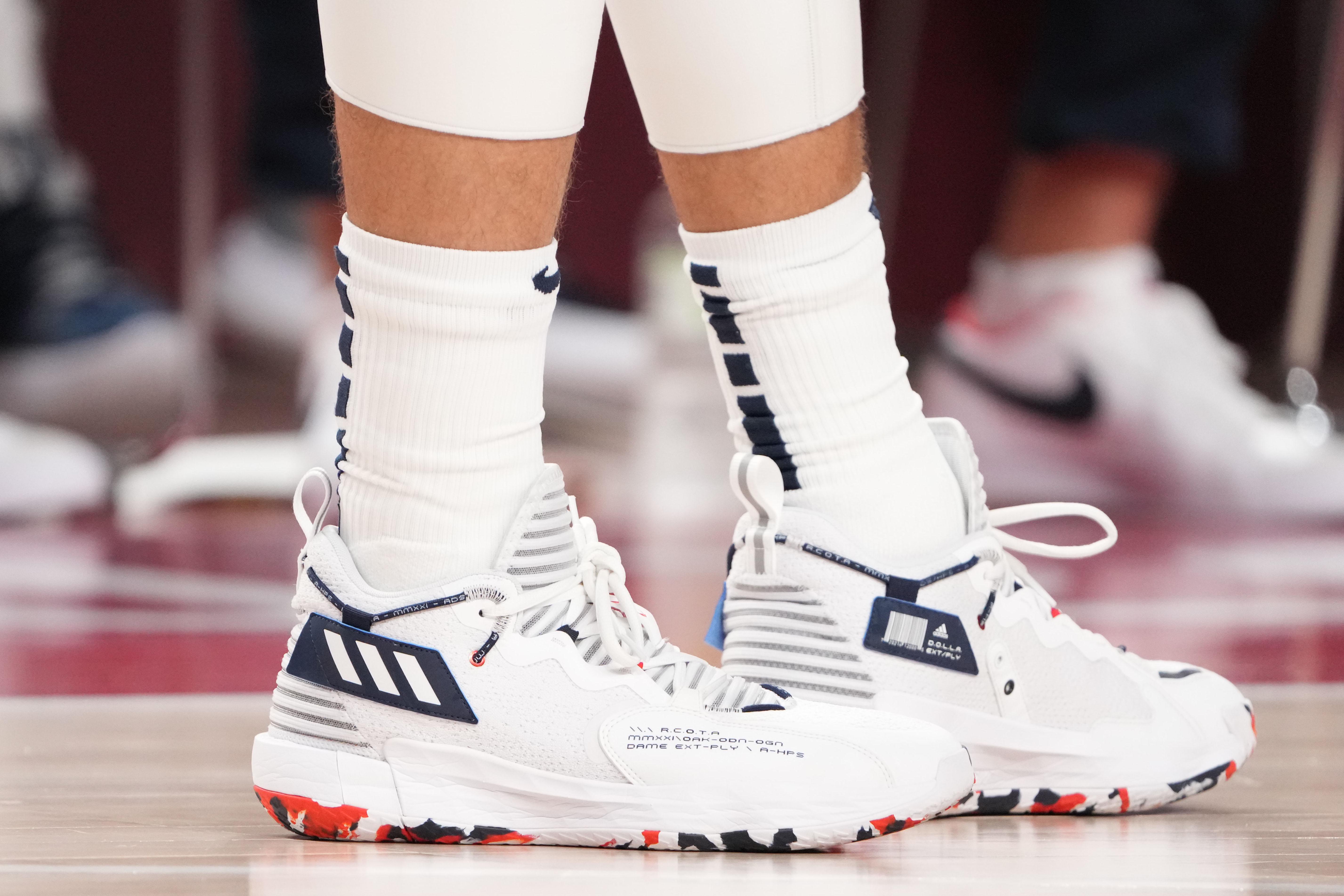 Zach LaVine's white and navy adidas basketball sneakers.