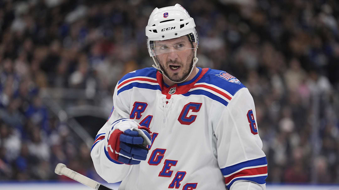 Mar 25, 2026; Toronto, Ontario, CAN; New York Rangers forward J.T. Miller (8) directs a teammate during break in the action against the Toronto Maple Leafs during the first period at Scotiabank Arena. Mandatory Credit: John E. Sokolowski-Imagn Images