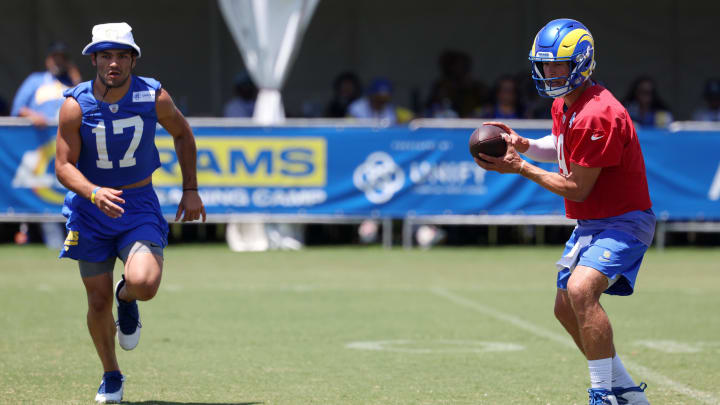 Jul 31, 2024; Los Angeles, CA, USA;  Los Angeles Rams wide receiver Puka Nacua (17) and quarterback Matthew Stafford (9) participate in jog through during training camp at Loyola Marymount University. Mandatory Credit: Kiyoshi Mio-USA TODAY Sports