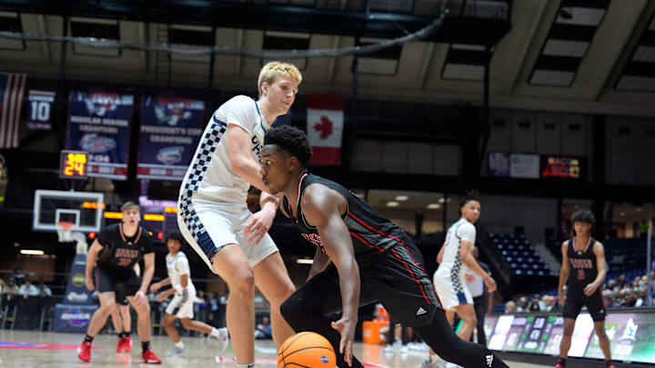 Mar 6, 2025; Macon, Georgia, USA; North Oconee small forward/guard Khamari Brooks (5) moves towards the basket during the North Oconee and Pace Academy boys AAAA state basketball championship game at the Macon Coliseum. North Oconee won 60-48. Mandatory Credit: Katie Goodale - Augusta Chronicle/USA TODAY NETWORK Mar 6, 2025; Macon, Georgia, USA; North Oconee small forward/guard Khamari Brooks (5) moves towards the basket during the North Oconee and Pace Academy boys AAAA state basketball championship game at the Macon Coliseum. North Oconee won 60-48. Mandatory Credit: Katie Goodale - Augusta Chronicle/USA TODAY NETWORK