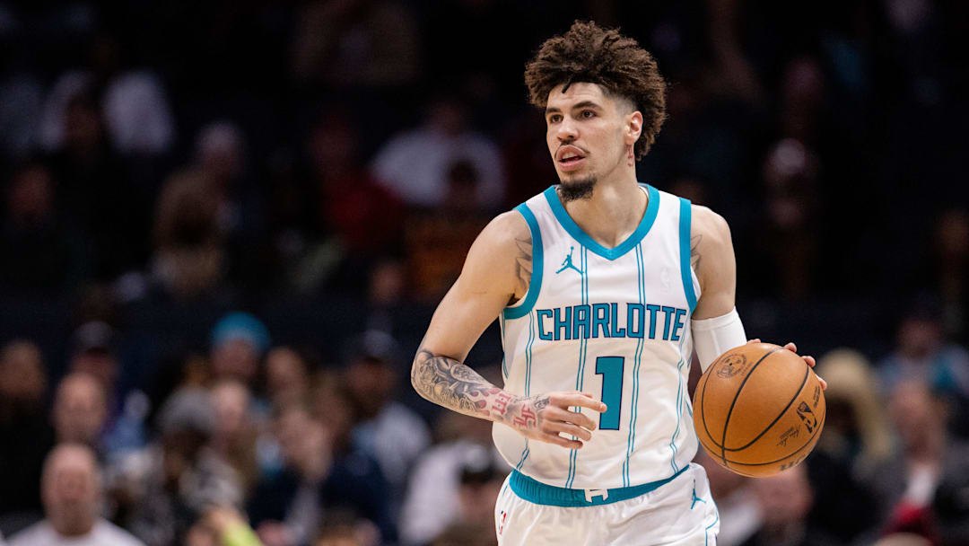 Mar 7, 2025; Charlotte, North Carolina, USA; Charlotte Hornets guard LaMelo Ball (1) brings the ball up court against the Cleveland Cavaliers during the first quarter at Spectrum Center. Mandatory Credit: Scott Kinser-Imagn Images