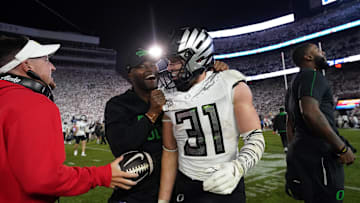 Sep 27, 2025; University Park, Pennsylvania, USA; Oregon Ducks defensive back Dillon Thieneman (31) reacts after defeating the Penn State Nittany Lions at Beaver Stadium. Mandatory Credit: James Lang-Imagn Images