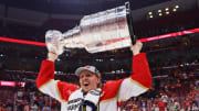 Mikkola lifts the Stanley Cup after the Floria Panthers win Game 7.