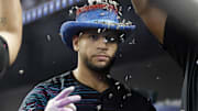 Aug 2, 2025; Miami, Florida, USA;  Miami Marlins catcher Agustin Ramirez (50) is showered with sunflower seeds in the dugout after hitting a home run against the New York Yankees during the first inning at loanDepot Park. Mandatory Credit: Rhona Wise-Imagn Images