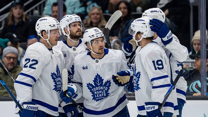 Jan 29, 2026; Seattle, Washington, USA; Toronto Maple Leafs, from left, defenseman Jake McCabe (22), defenseman Oliver Ekman-Larsson (95), forward Nicholas Robertson (89), forward Calle Jarnkrok (19) and forward Nicolas Roy (55) celebrate a goal during the first period at Climate Pledge Arena. Mandatory Credit: Stephen Brashear-Imagn Images