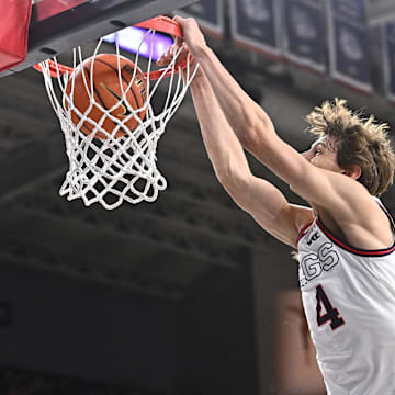 Gonzaga is a home favorite against UCLA in Saturday's college basketball action.