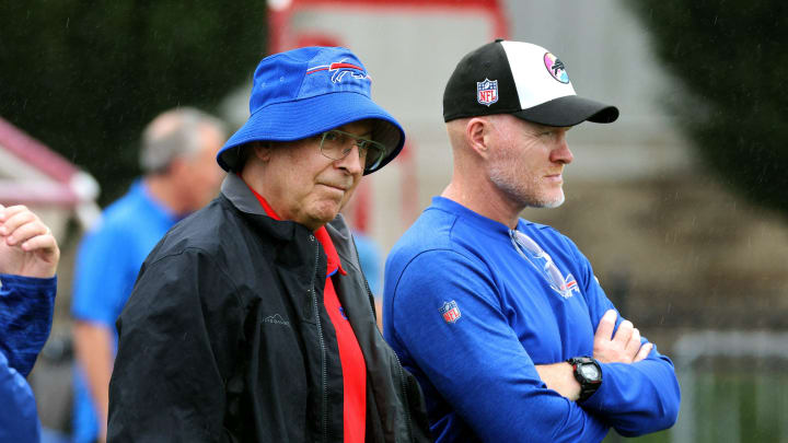 Bills owner Terry Pegula (L) visits with head coach Sean McDermott during training camp at St. John Fisher University.