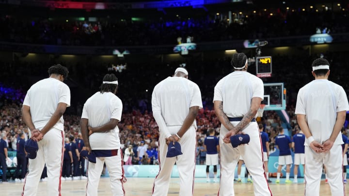 Jul 28, 2024; Villeneuve-d'Ascq, France; Team USA during the national anthems before a game against Serbia during the Paris 2024 Olympic Summer Games at Stade Pierre-Mauroy. Mandatory Credit: John David Mercer-USA TODAY Sports