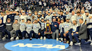 The Penn State wrestling team celebrates winning the team title at the 2025 NCAA Wrestling Championships.