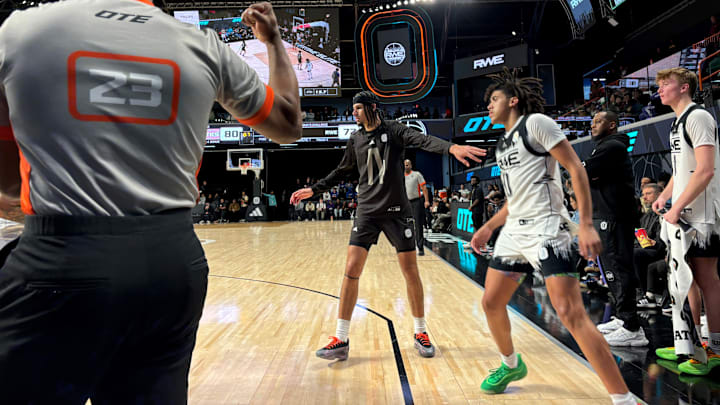 Cincinnati Bearcats recruit Shon Abaev of Fear of God Athletics guards Newport, Kentucky's Taylen Kinney of RWE at the Overtime Elite Arena in Atlanta.