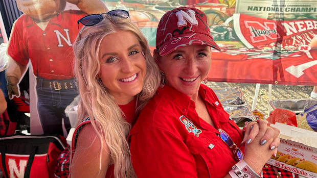 Kelli Anne (Right) and Sidney, a former Nebraska Athletics dancer - one of the many featured guests of her tailgate. 