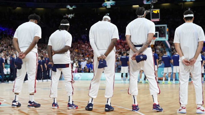 Jul 28, 2024; Villeneuve-d'Ascq, France; Team USA during the national anthems before a game against Serbia during the Paris 2024 Olympic Summer Games at Stade Pierre-Mauroy. Mandatory Credit: John David Mercer-USA TODAY Sports