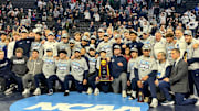 The Penn State wrestling team celebrates winning the team title at the 2025 NCAA Wrestling Championships.