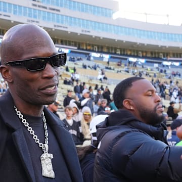 Nov 16, 2024; Boulder, Colorado, USA; Retired American football player Chad Johnson on the sidelines before the game between the Utah Utes against the Colorado Buffaloes at Folsom Field. Mandatory Credit: Ron Chenoy-Imagn Images