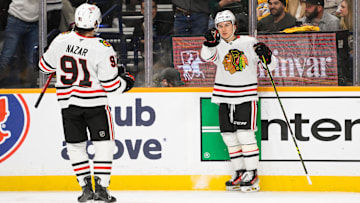 Jan 16, 2025; Nashville, Tennessee, USA;  Chicago Blackhawks center Connor Bedard (98) celebrates his goal with center Frank Nazar (91) against the Nashville Predators during the second period at Bridgestone Arena. Mandatory Credit: Steve Roberts-Imagn Images