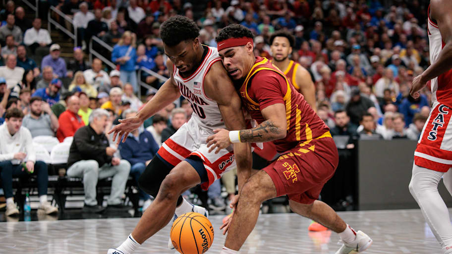 Iowa State forward Joshua Jefferson collides with Arizona forward Tobe Awaka.