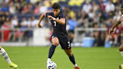 Jun 10, 2025; Nashville, Tennessee, USA;  United States forward Quinn Sullivan (7) dribbles the ball against the Switzerland during the first at Geodis Park. Mandatory Credit: Steve Roberts-Imagn Images
