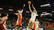 Dec 6, 2024; Evanston, Illinois, USA; Illinois Fighting Illini forward Ben Humrichous (3) defends Northwestern Wildcats guard Brooks Barnhizer (13) during the second half at Welsh-Ryan Arena. Mandatory Credit: David Banks-Imagn Images